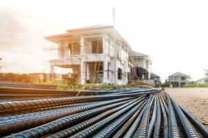 steel rebar to reinforce concrete at house construction site